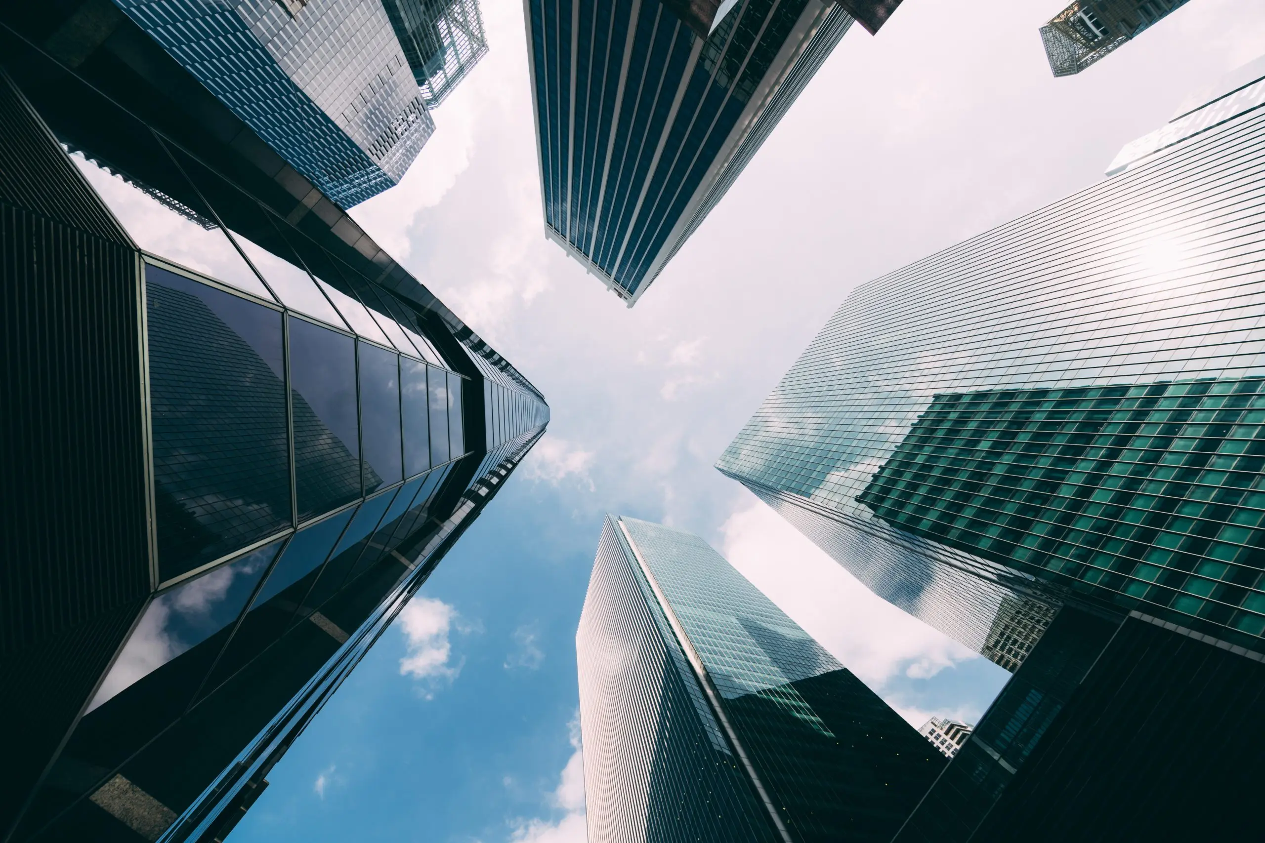Looking up at high rise buildings