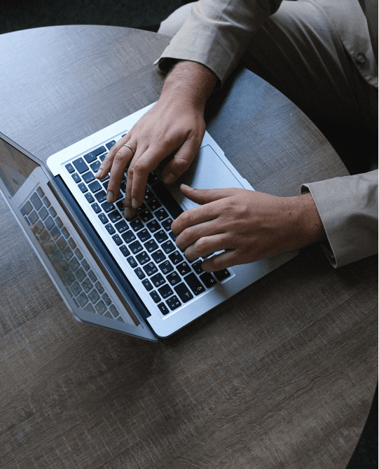 Person looking at Employment Status Disputes on his laptop